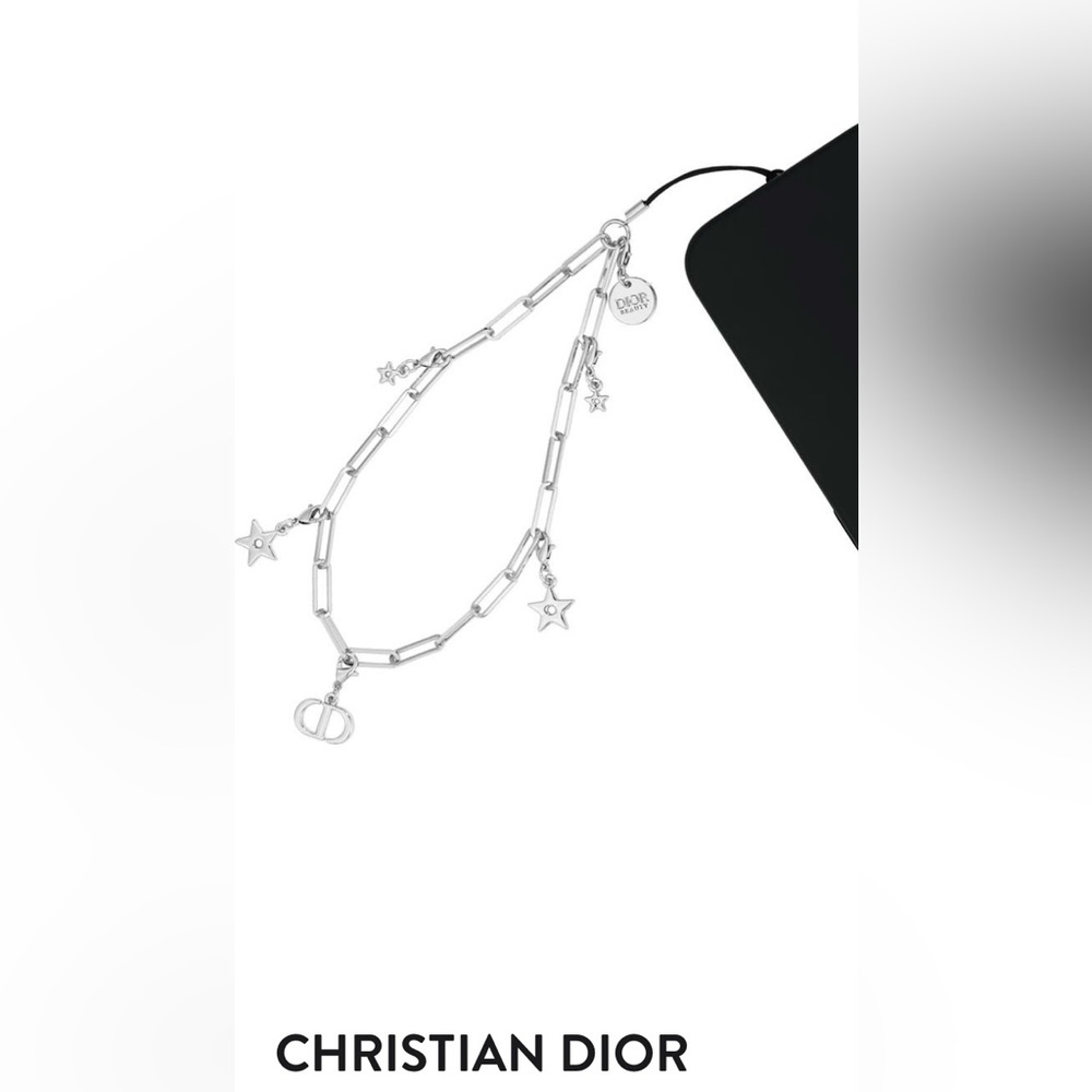 New in box  Dior silver phone charm